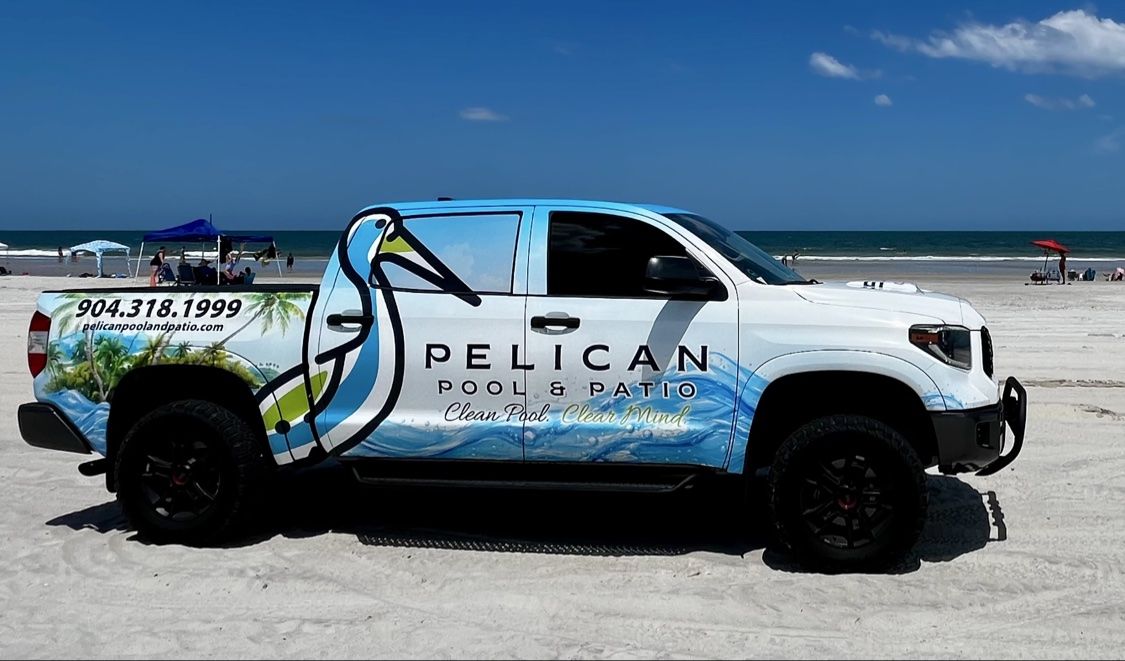 Pelican Pool and Patio pool service truck serving Northeast Florida