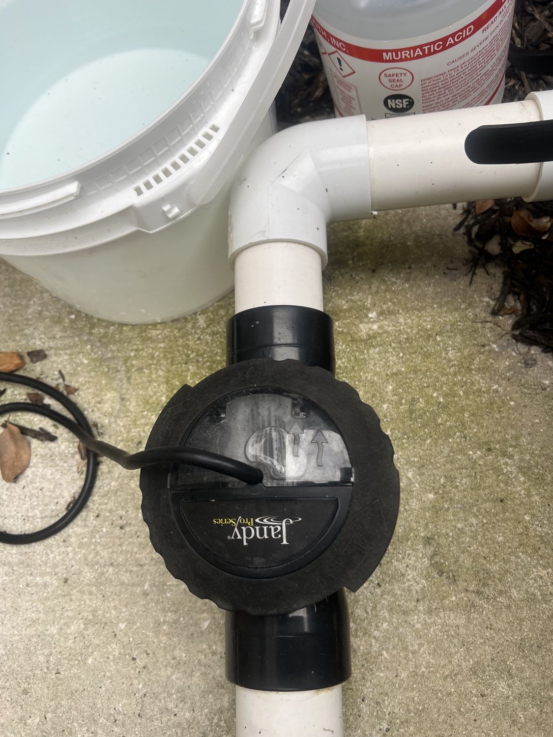 Salt chlorine generator cell in the pool plumbing during the cleaning process